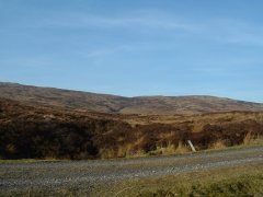 Look out for the white marker post on the left hand side of the path. Follow the burn up to the loch.